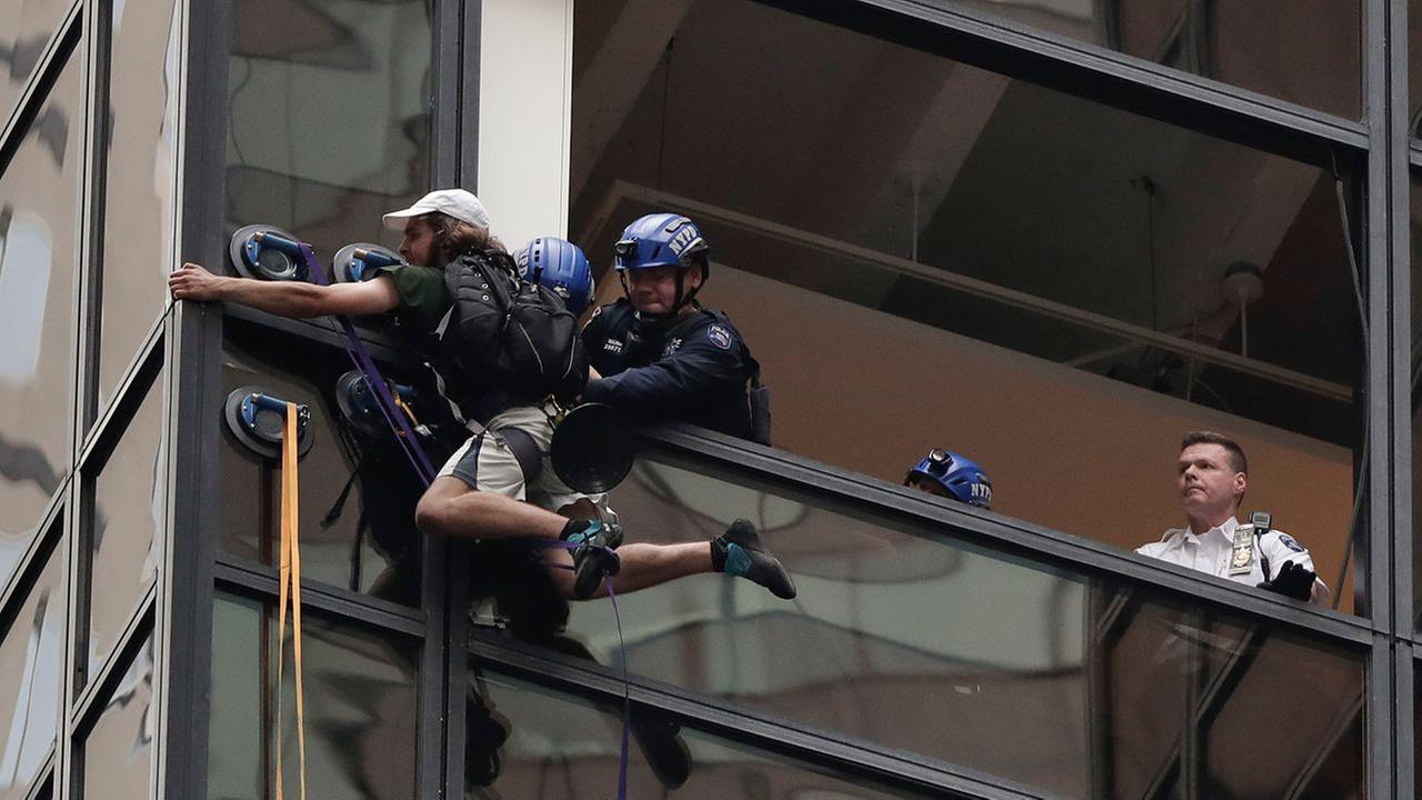 Police arrests a man climbing Trump Tower