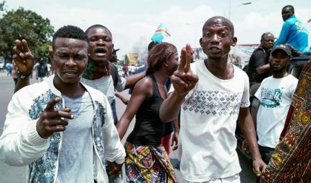 Protests turn violent in Congo capital police officer lynched