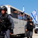 Israeli forces kill two Palestinian assailants police say as violence surges
