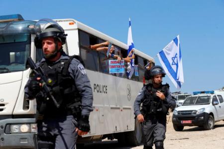 Israeli forces kill two Palestinian assailants police say as violence surges