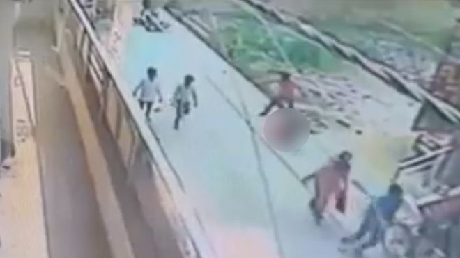 Bystanders watch as Delhi woman killed