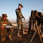 Iraqi Kurds say they captured town near Mosul