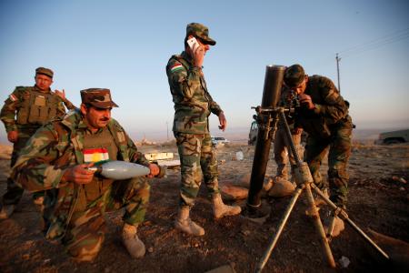 Iraqi Kurds say they captured town near Mosul