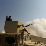 Iraqi Kurds claim capture of town in advance on Mosul