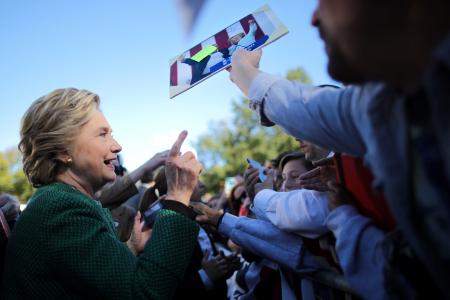 Clinton calls Trump a sore loser