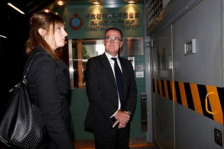 Hong Kong judge warns of torture images as British bankers trial begins
