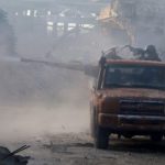 Syrian state media say militants fired poison gas in Aleppo