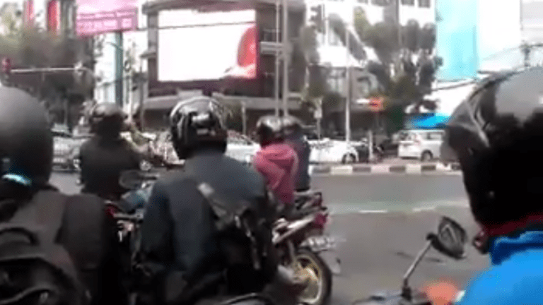 Porn film plays on Jakarta billboard police investigate