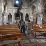 Church bells peal in town retaken by Iraqi troops from Islamic State