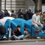 More migrants pitch tents on Paris streets as Calais camp shuts