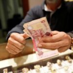 Libyan officials squabble residents protest as cash crisis hits home