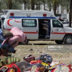 Suicide bombers in ambulances kill 21 people in Iraq officials