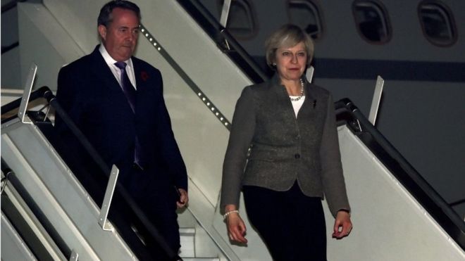 British PM Theresa May in India says UK to be free trade advocate