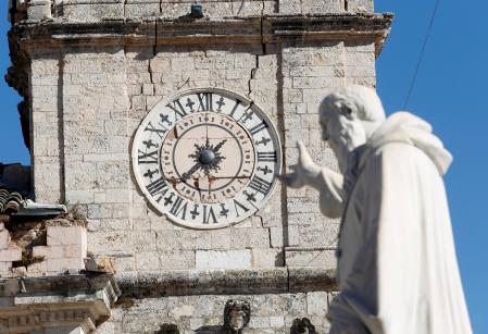 Holy icons dazed dog saved from rubble in quake hit Italy