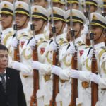 Philippines President Rodrigo Duterte review honour guards during a welcome ceremony at the Great Hall of the People in Beijing October 2016 EPA