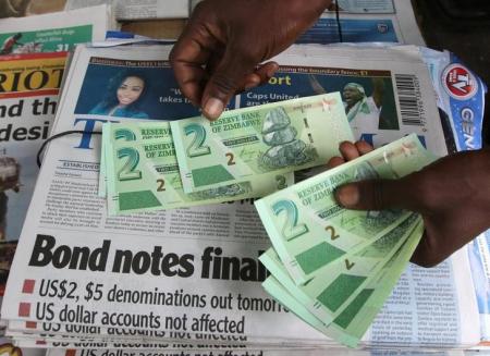 Zimbabwe launches bond notes currency in bid to ease cash crunch