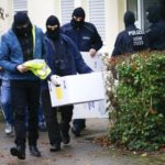 Police raid mosques flats across Germany as government bans Islamist group