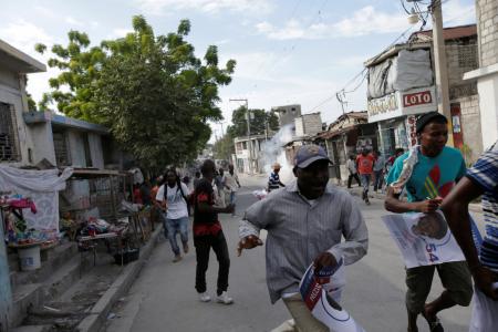 Haiti police clash with demonstrators ahead of election results