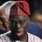 Obasanjo tongues out
