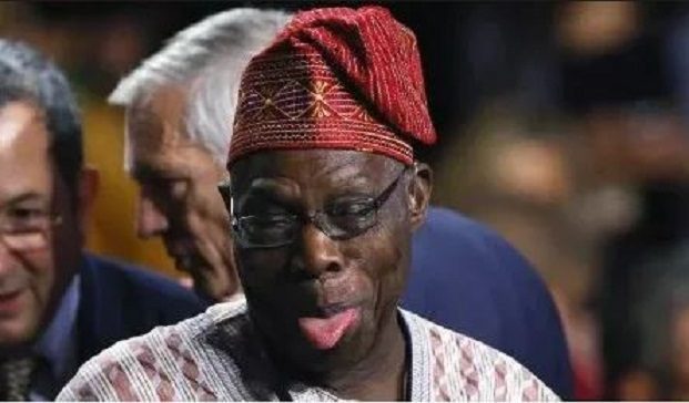 Obasanjo tongues out