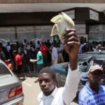 Zimbabwe police use water cannon against fake money protest