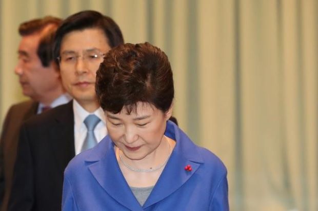 After impeachment South Korea prime minister urges calm vigilance