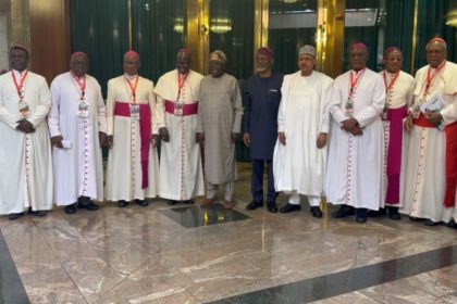 Tinubu standing with Catholic Bishops